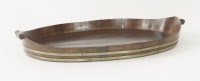 Lot 398 - A George III mahogany oval and brass bound tray