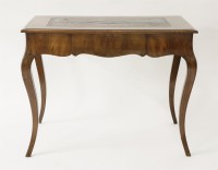 Lot 458 - A Victorian walnut writing table