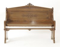 Lot 381 - An Aesthetic Movement mahogany hall seat