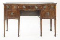 Lot 470 - A George III mahogany serpentine sideboard