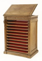 Lot 390 - A Victorian oak folio stand