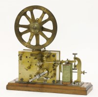 Lot 64 - An unusual twin coil electric and clockwork ticker tape machine