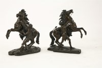 Lot 109 - A pair of bronze Marly horse groups