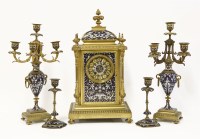 Lot 295 - A gilt bronze and champlevé enamel clock garniture