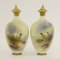 Lot 23 - A pair of Royal Worcester Vases and Covers