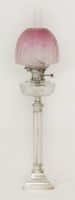 Lot 144 - An Edwardian silver-plated oil lamp