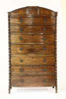 Lot 371 - A Regency mahogany bow front chest on chest