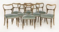 Lot 446 - A set of eight Victorian rosewood balloon back dining chairs