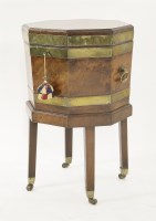 Lot 447 - A George III brass bound mahogany octagonal wine cooler