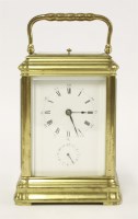 Lot 309 - A French brass carriage clock