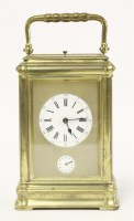 Lot 310 - A French brass carriage clock