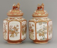 Lot 237 - A pair of Kutani Vases and Covers