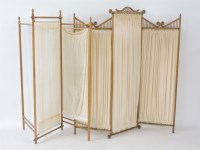 Lot 504 - An early 20th century simulated bamboo three fold screen