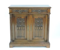 Lot 423 - A 19th/20th century French Gothic Revival walnut side cabinet