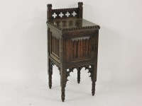 Lot 469 - An oak Gothic Revival style bedside cabinet