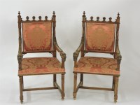 Lot 505 - A pair of French walnut Gothic Revival elbow chairs