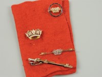 Lot 63 - Four assorted brooches