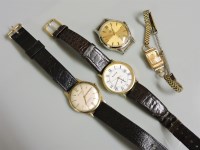 Lot 66 - An 18ct gold ladies mechanical strap watch