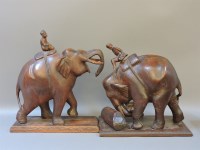 Lot 346 - A pair of carved Indian elephants and mahouts