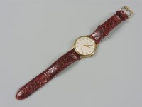 Lot 1 - A 9ct gold Garrard gentleman's mechanical strap watch