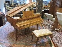 Lot 507 - A Cramer walnut baby grand piano