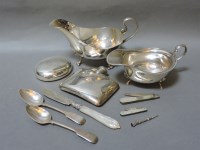 Lot 128 - Two silver sauceboats