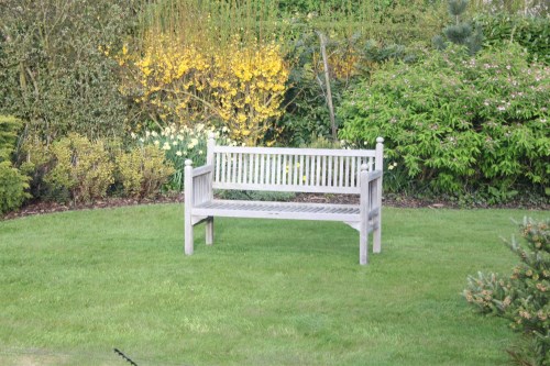 Lot 1039 - A Heal's teak garden seat
