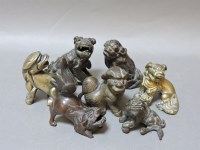 Lot 82 - Seven Chinese bronze dogs