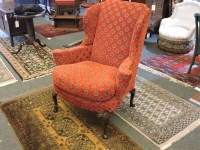 Lot 515 - A George III mahogany wing backed armchair