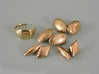 Lot 9 - A pair of 9ct gold lozenge shaped cufflinks