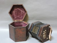 Lot 207 - A 19th century Lachenal & Co 'Peerless' Anglo German twenty-one button accordion