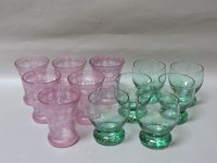 Lot 245 - Two sets of six coloured glass tumblers