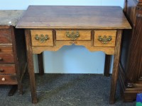 Lot 420 - Early George III oak three drawer side table