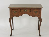 Lot 501 - A George II oak lowboy