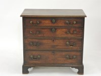 Lot 452 - A George III mahogany chest of four graduated long drawers