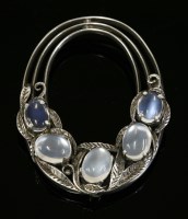 Lot 4 - A silver Arts and Crafts moonstone brooch