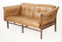 Lot 584 - An 'Ilona' tan leather settee