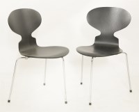 Lot 585 - A pair of 'Ant' chairs