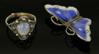 Lot 13 - An Arts & Crafts silver semi-black opal ring