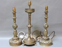 Lot 164 - A pair of French brass table lamps