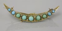 Lot 20 - A late Victorian turquoise set open crescent brooch
