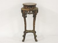 Lot 397 - A 19th/20th century carved hardwood jardinière stand