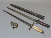 Lot 97 - An old bayonet and scabbard