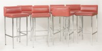 Lot 689 - A set of eight red vinyl bar stools