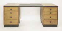Lot 190 - A Waring & Gillow satin birch pedestal desk