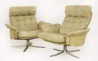 Lot 532 - A pair of leather and suede armchairs