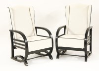 Lot 140 - A pair Art Deco ebonised armchairs