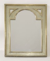 Lot 526 - A brass and silver finish mirror