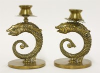 Lot 107 - A pair of brass candlesticks