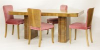 Lot 371 - An Art Deco walnut dining table